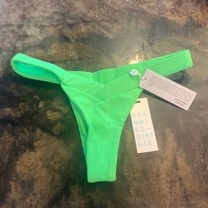 frankie’s bikinis neon green swimsuit bottoms.